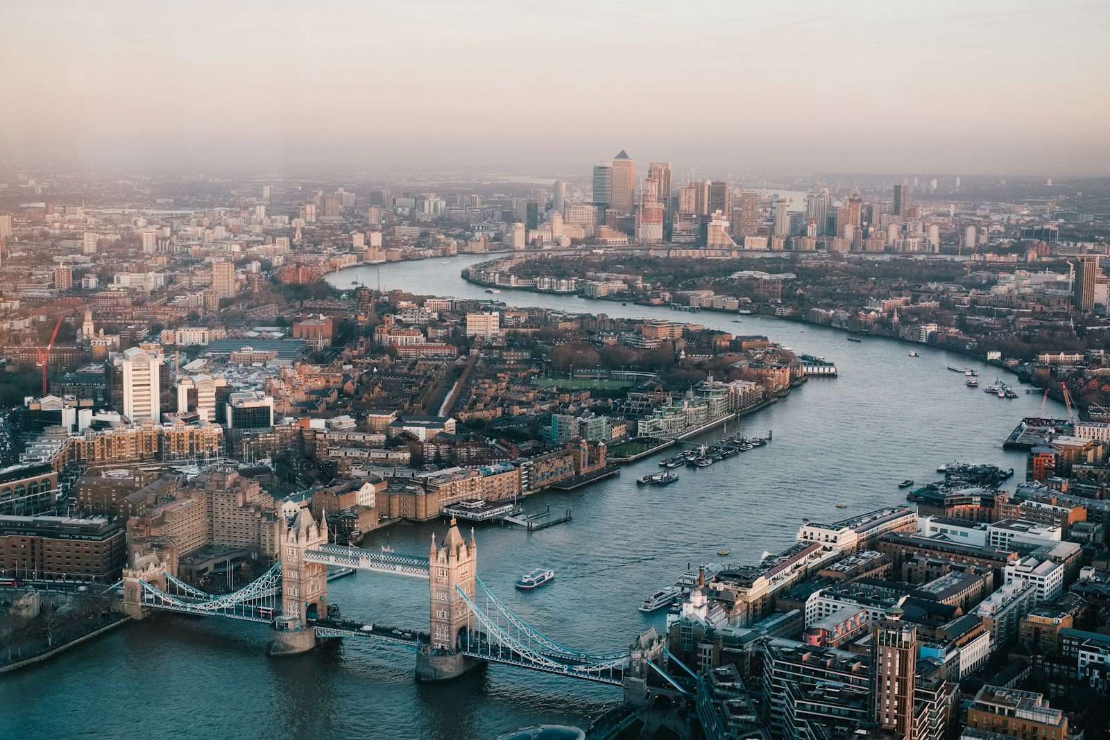 Skyline view of London at dusk with the River Thames and business districts