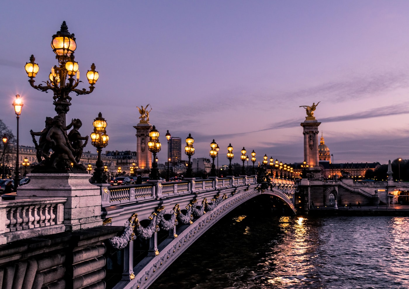 Paris street scene with cafes and elegant Haussmann buildings
